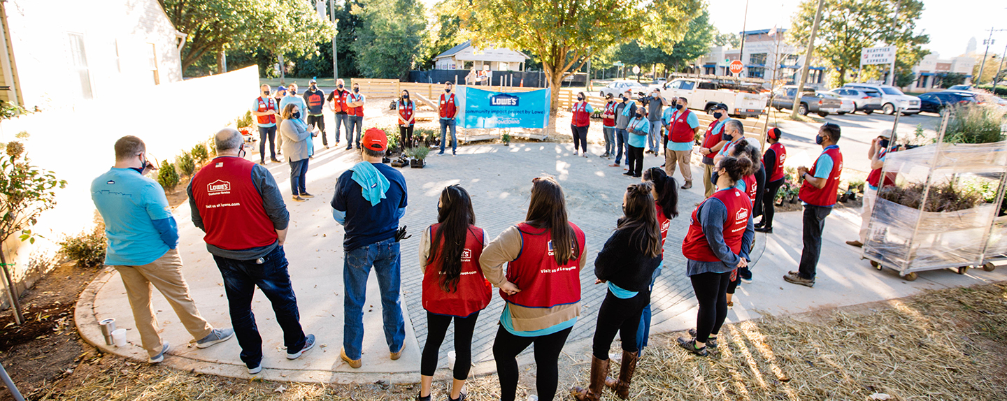 Lowe's associates gathered in a circle