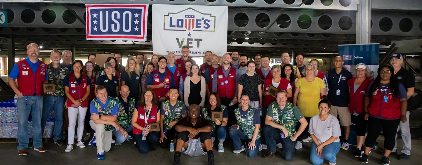 Lowe's associates and USO members at snack pack event