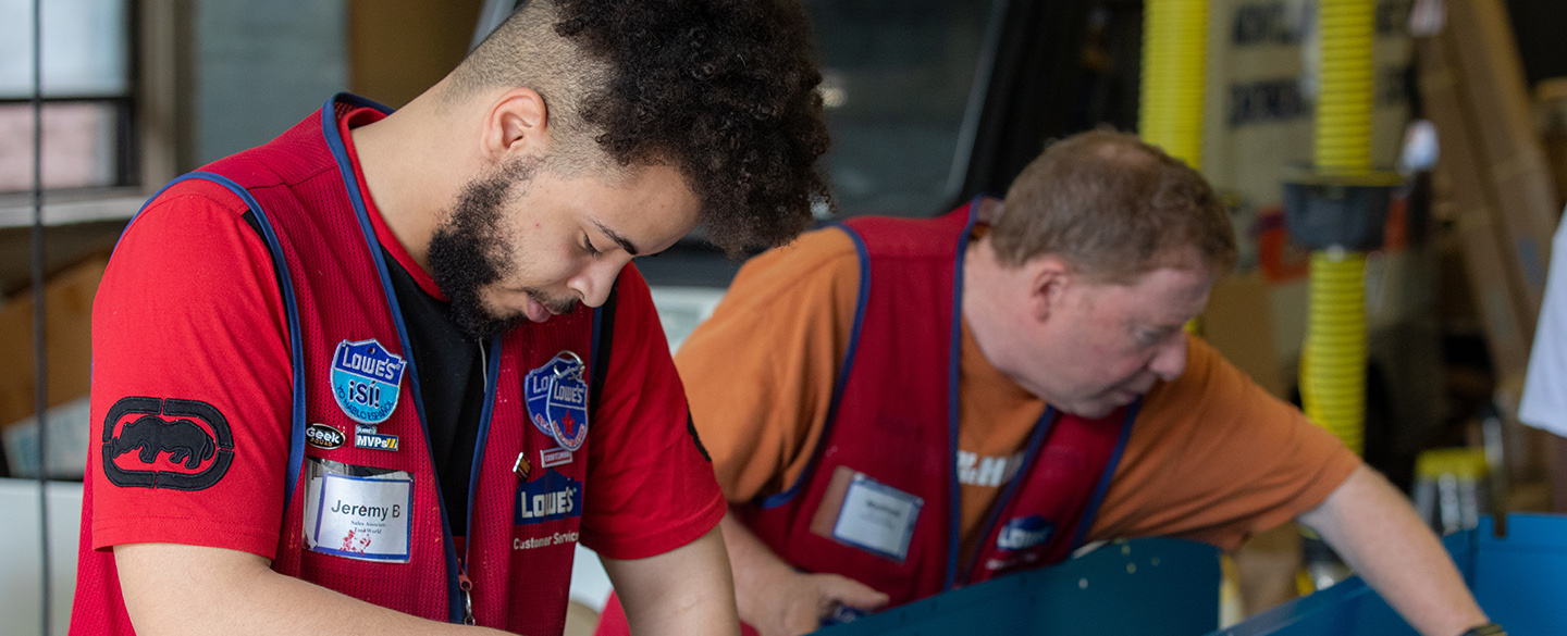 Lowe's associates working on community project