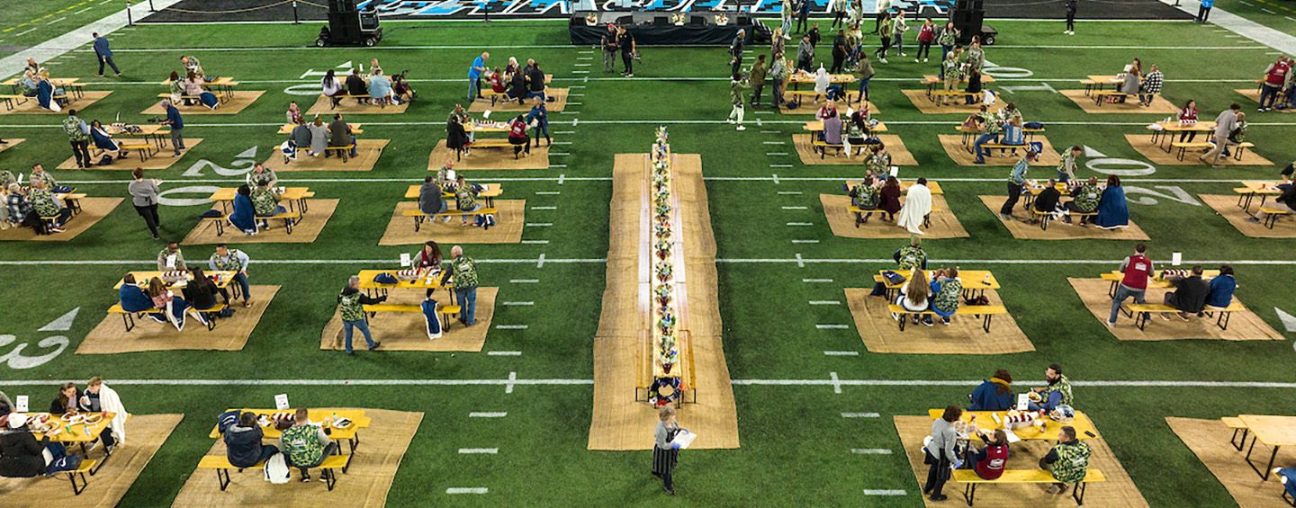 Lowe's Veteran associates and their families having a special picnic on Panthers field as part of NFL's Salute to Service.