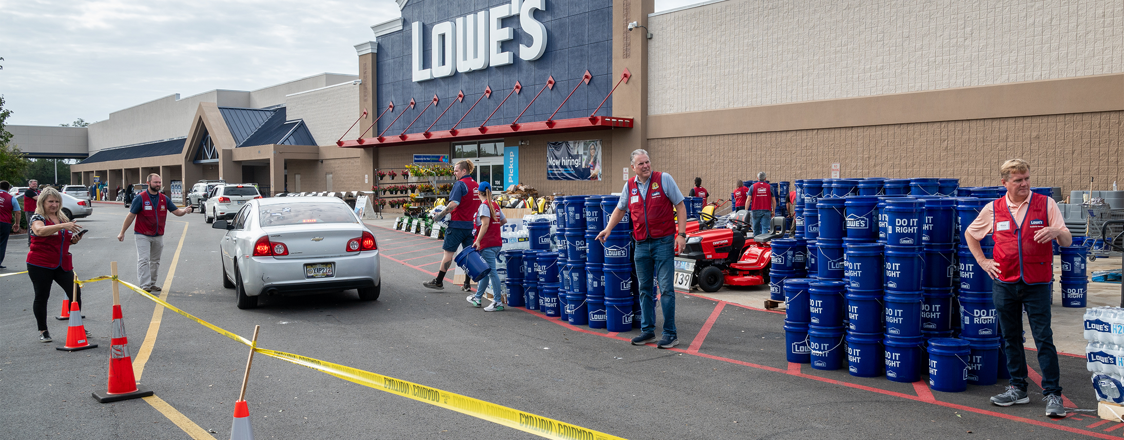 Cars pull through the bucket brigade