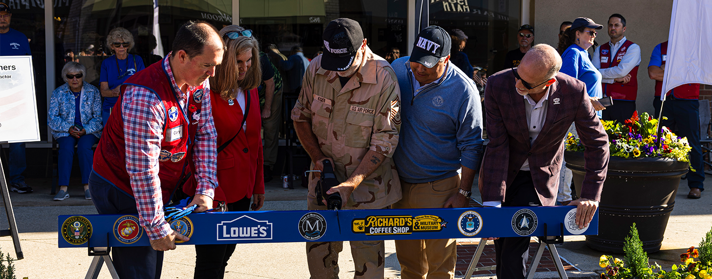 Richard's Cafe board cutting celebration.