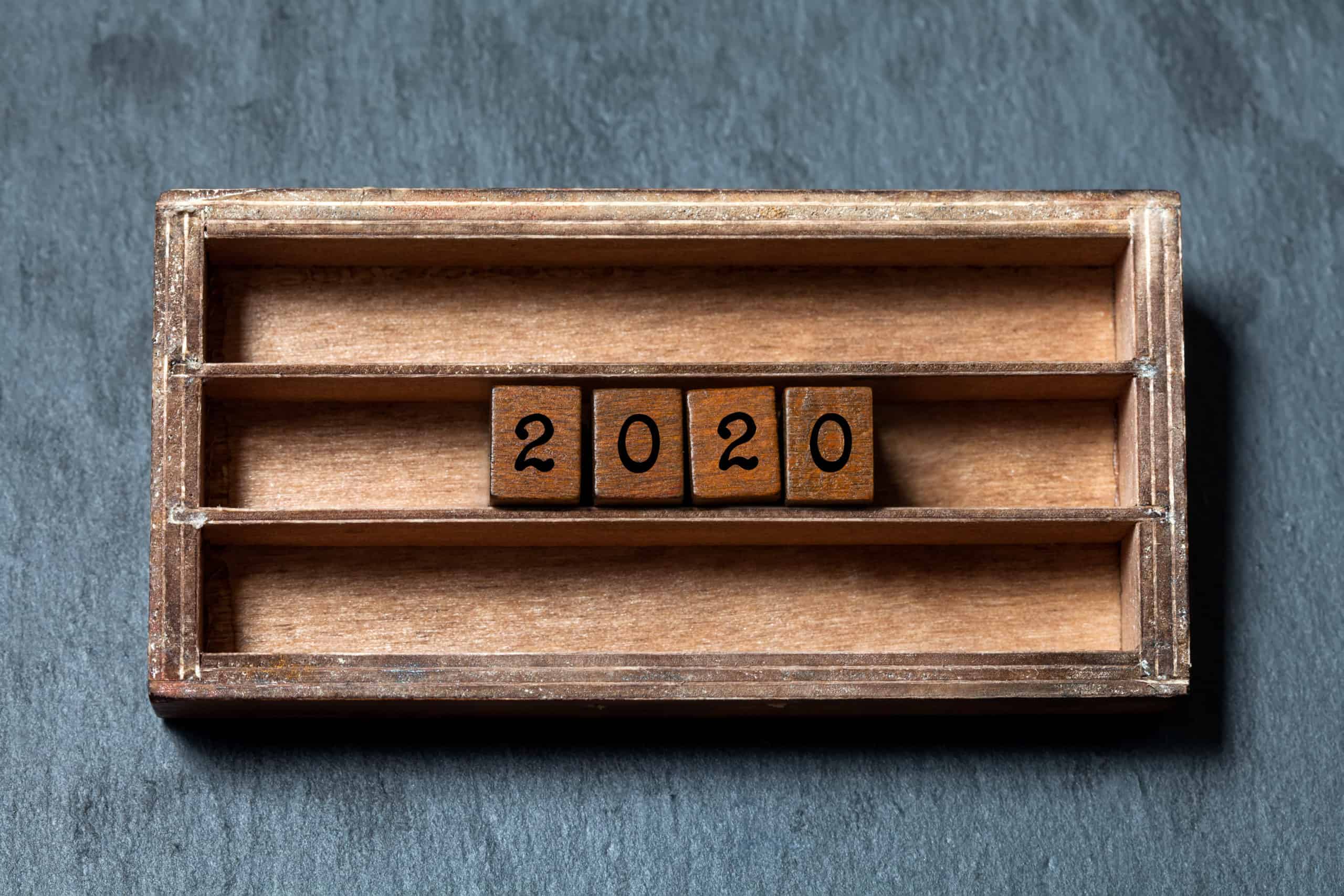photodune-S6hCfZuw-2020-new-year-retro-style-card-two-thousand-and-twentieth-year-number-wooden-cubes-in-box-shelf-xl-scaled
